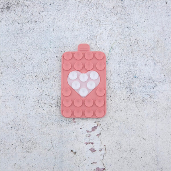 Peachfarbener Noppie-Heart-Patch mit weißem Herz, Silikon-Smartphone-Halterung mit Saugnäpfen für glatte Oberflächen